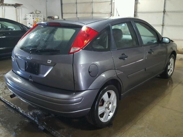 1FAHP37N07W339694 - 2007 FORD FOCUS ZX5 GRAY photo 4