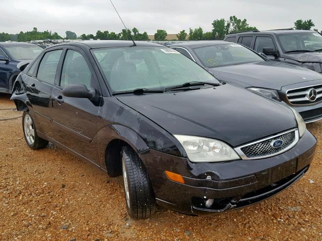 1FAFP34N17W158518 - 2007 FORD FOCUS ZX4 BLACK photo 1