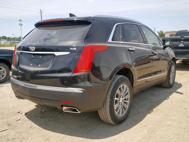 1GYKNCRS7JZ185686 - 2018 CADILLAC XT5 LUXURY BLACK photo 4