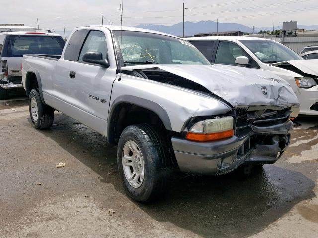 1B7GG12XX2S722061 - 2002 DODGE DAKOTA BAS SILVER photo 1