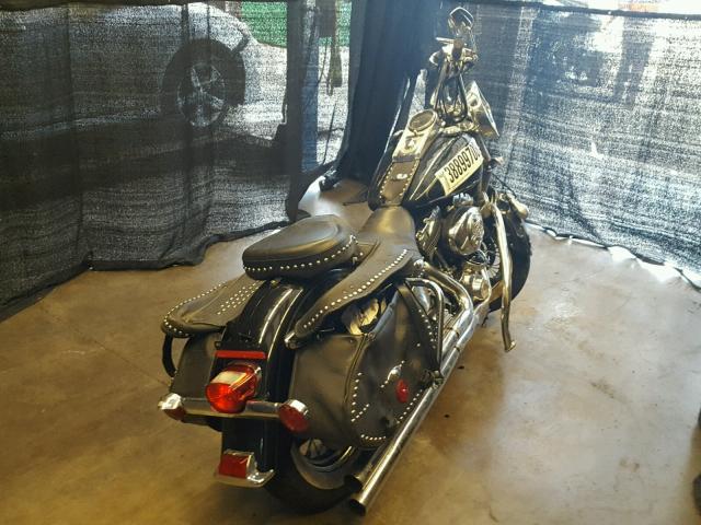 1HD1BWB116Y034433 - 2006 HARLEY-DAVIDSON FLSTCI BLACK photo 4