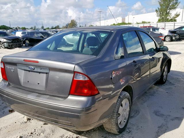 1FAFP34N97W118509 - 2007 FORD FOCUS ZX4 GRAY photo 4