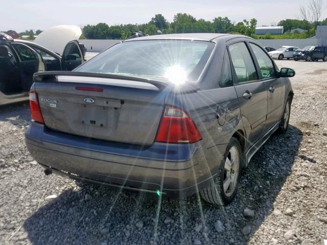 1FAHP34N37W260931 - 2007 FORD FOCUS ZX4 GRAY photo 4