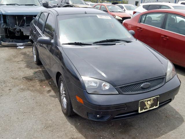 1FAHP34N27W263187 - 2007 FORD FOCUS ZX4 BLACK photo 1