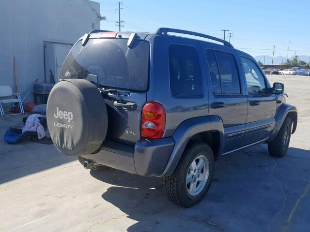 1J4GK58K12W295762 - 2002 JEEP LIBERTY LI BLUE photo 4