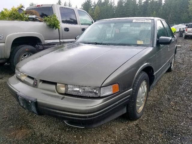 1G3WH52M7VF349242 - 1997 OLDSMOBILE CUTLASS SU GRAY photo 2