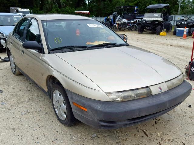 1G8ZG528XVZ237398 - 1997 SATURN SL1 GOLD photo 1