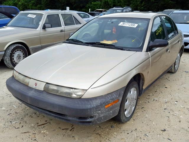 1G8ZG528XVZ237398 - 1997 SATURN SL1 GOLD photo 2