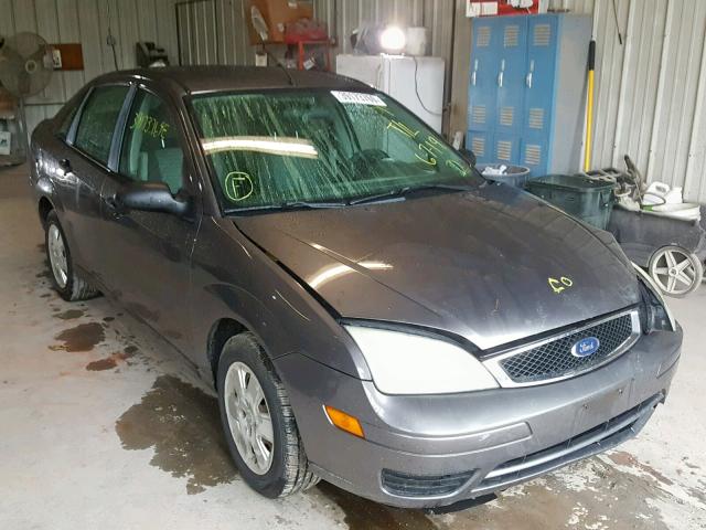 1FAHP34NX7W267133 - 2007 FORD FOCUS ZX4 GRAY photo 1