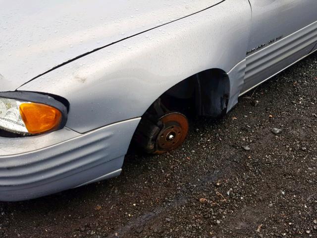 1G2NE52E3XC552988 - 1999 PONTIAC GRAND AM S SILVER photo 10