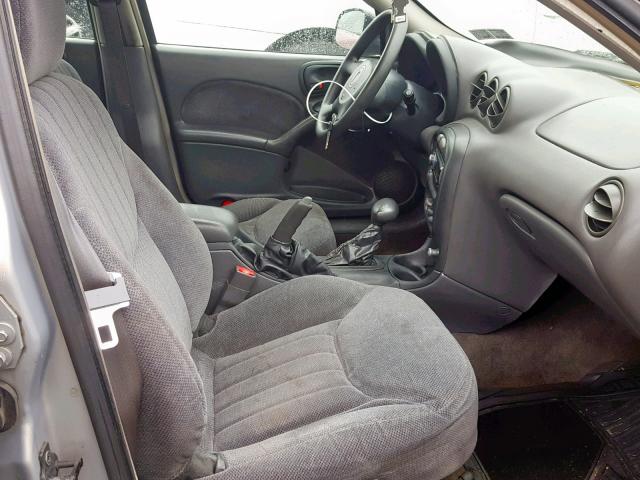 1G2NE52E3XC552988 - 1999 PONTIAC GRAND AM S SILVER photo 5