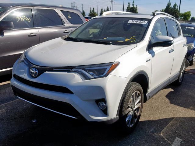 JTMDJREV7GD050727 - 2016 TOYOTA RAV4 HV LI WHITE photo 2