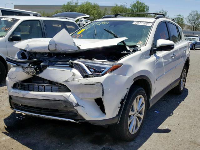 2T3DFREVXJW722999 - 2018 TOYOTA RAV4 LIMIT WHITE photo 2