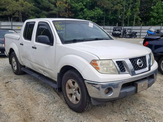 1N6AD07U59C419326 - 2009 NISSAN FRONTIER C WHITE photo 1