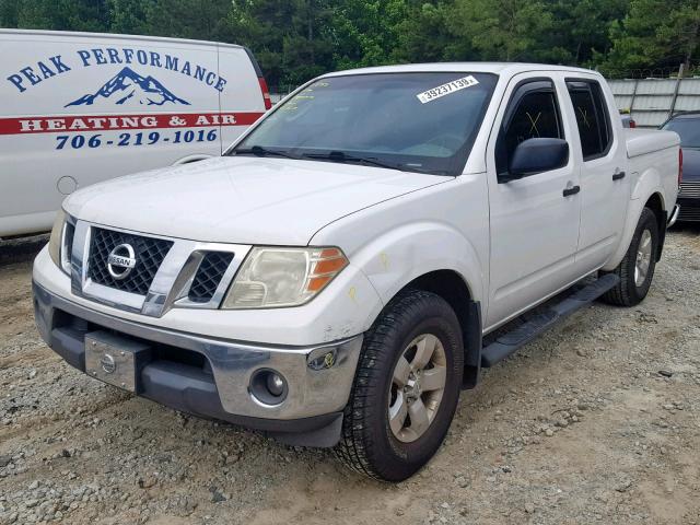 1N6AD07U59C419326 - 2009 NISSAN FRONTIER C WHITE photo 2