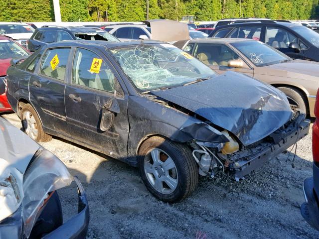 1FAHP34N95W159714 - 2005 FORD FOCUS ZX4 GRAY photo 1