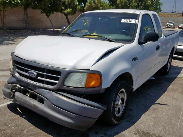 2FTRX17274CA90584 - 2004 FORD F-150 HERI WHITE photo 2