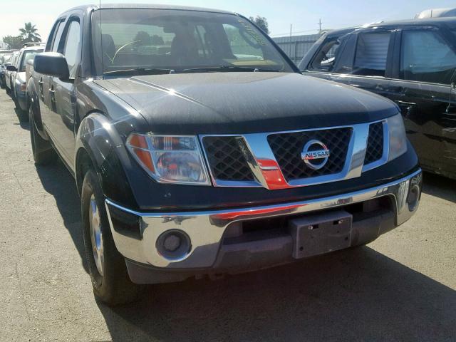 1N6AD09U17C459591 - 2007 NISSAN FRONTIER C BLACK photo 1