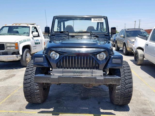 1J4FA29P6YP763172 - 2000 JEEP WRANGLER / BLACK photo 9