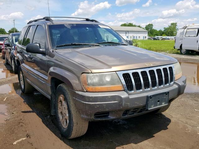 1J4GW48S61C549612 - 2001 JEEP GRAND CHER TAN photo 1