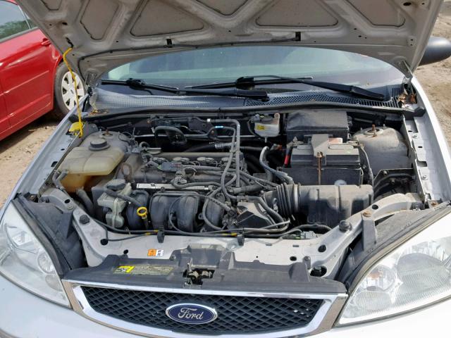 1FAFP34N97W156869 - 2007 FORD FOCUS ZX4 SILVER photo 7