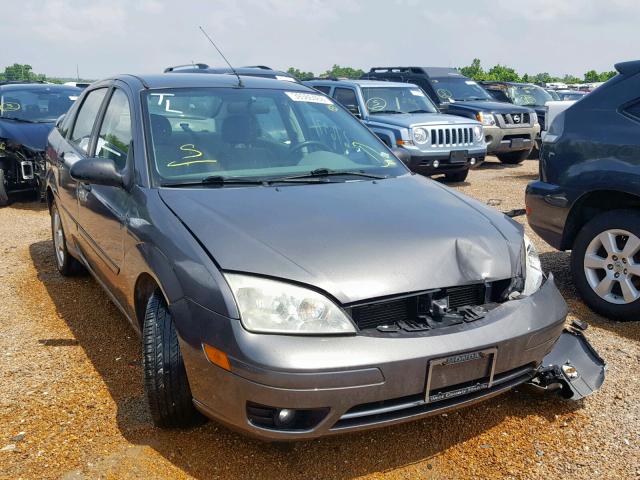 1FAHP34N35W167873 - 2005 FORD FOCUS ZX4 GRAY photo 1