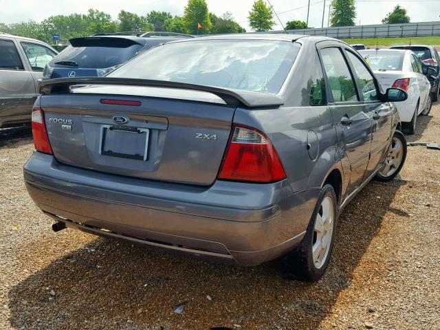 1FAHP34N35W167873 - 2005 FORD FOCUS ZX4 GRAY photo 4