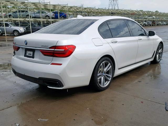 WBA7F2C53GG418194 - 2016 BMW 750 XI WHITE photo 4