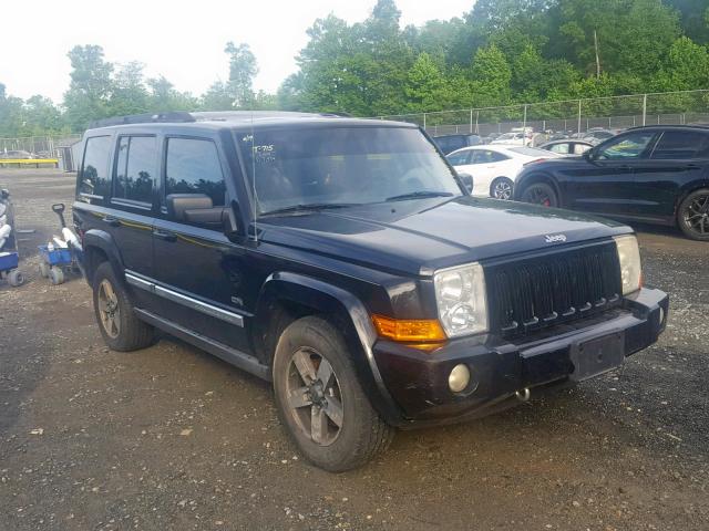 1J8HG48N96C263884 - 2006 JEEP COMMANDER BLACK photo 1