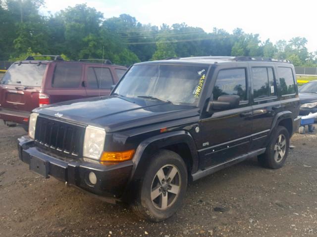 1J8HG48N96C263884 - 2006 JEEP COMMANDER BLACK photo 2