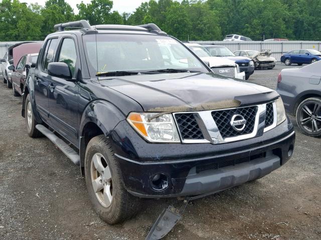 1N6AD07W57C435735 - 2007 NISSAN FRONTIER C BLACK photo 1