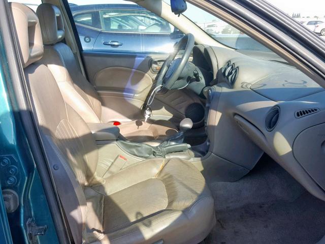 1G2NE52E8XM878831 - 1999 PONTIAC GRAND AM S GREEN photo 5