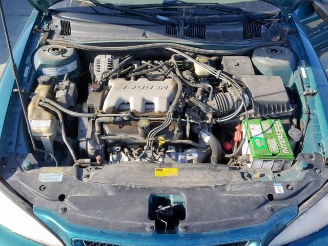 1G2NE52E8XM878831 - 1999 PONTIAC GRAND AM S GREEN photo 7