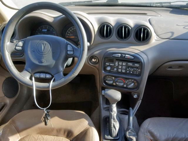 1G2NE52E8XM878831 - 1999 PONTIAC GRAND AM S GREEN photo 9