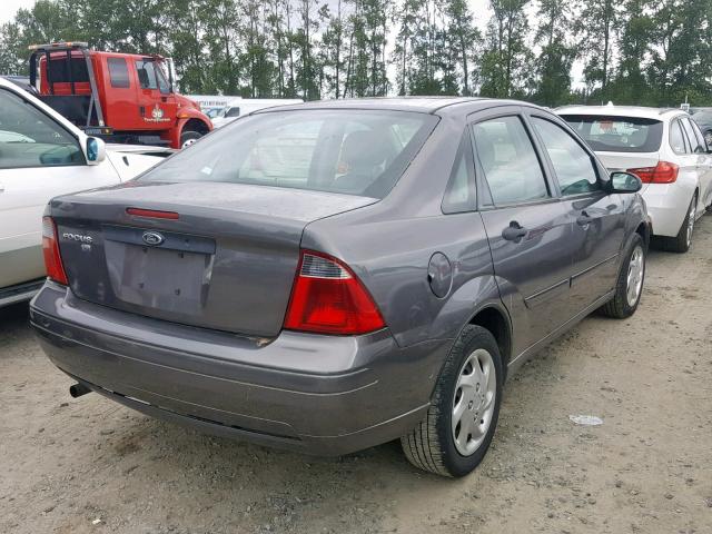 1FAFP34N37W220453 - 2007 FORD FOCUS ZX4 GRAY photo 4