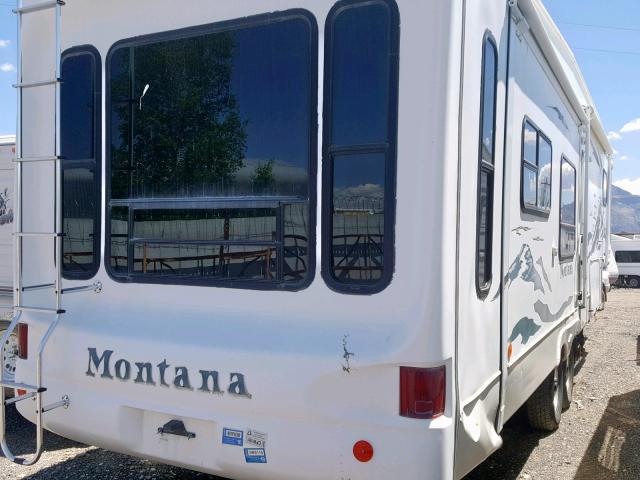 4YDF340234D509439 - 2004 KEYSTONE MONTANA WHITE photo 4