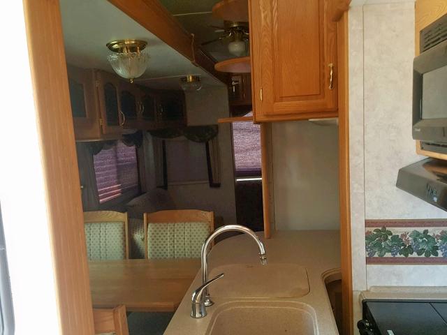 4YDF340234D509439 - 2004 KEYSTONE MONTANA WHITE photo 6