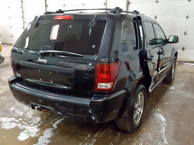 1J8GR48K79C555565 - 2009 JEEP GRAND CHER BLACK photo 4