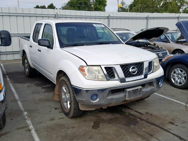 1N6AD07U69C401711 - 2009 NISSAN FRONTIER C WHITE photo 1