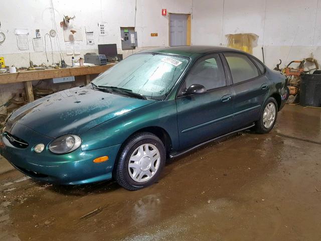 1FAFP52U1XG167901 - 1999 FORD TAURUS LX GREEN photo 2