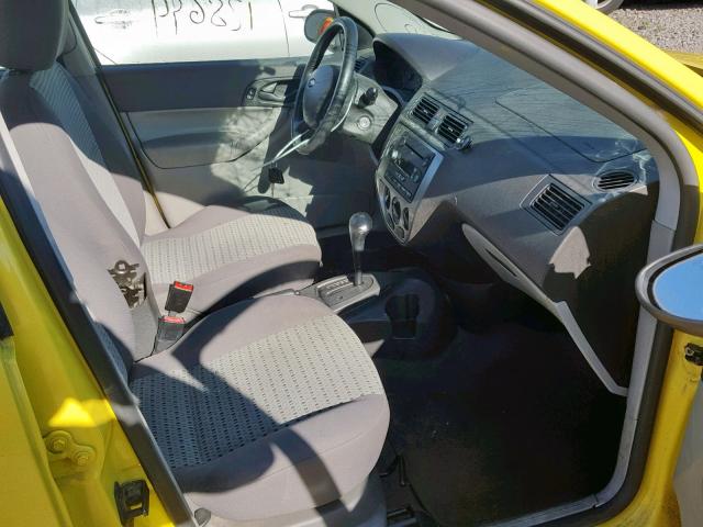 1FAHP34N37W243000 - 2007 FORD FOCUS ZX4 YELLOW photo 5