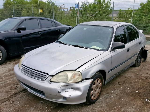 1HGEJ6671XL053424 - 1999 HONDA CIVIC LX SILVER photo 2