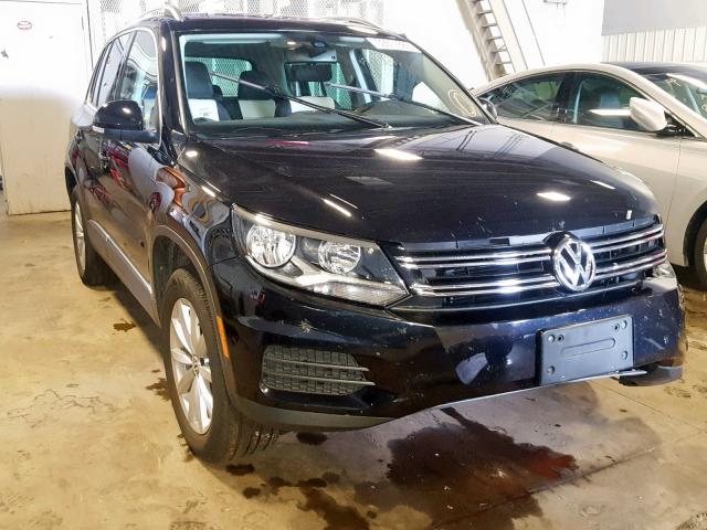 WVGSV7AX6HK022336 - 2017 VOLKSWAGEN TIGUAN WOL BLACK photo 1