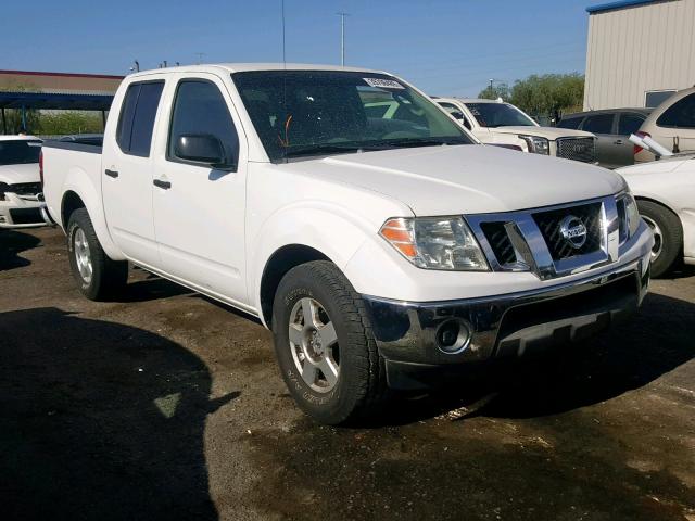 1N6AD07U19C422496 - 2009 NISSAN FRONTIER C WHITE photo 1