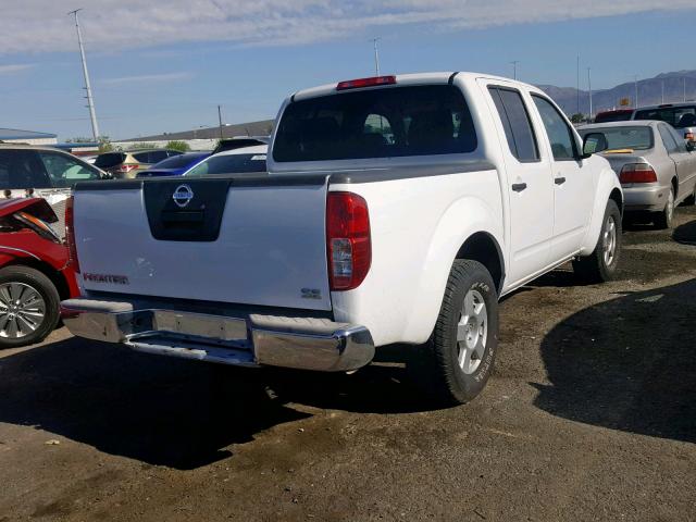 1N6AD07U19C422496 - 2009 NISSAN FRONTIER C WHITE photo 4