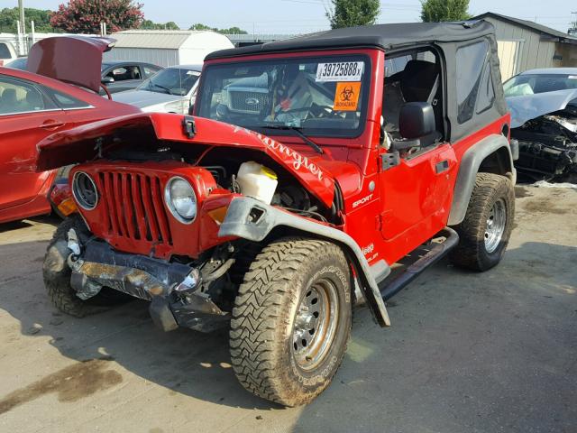 1J4FA49S84P747310 - 2004 JEEP WRANGLER / RED photo 2