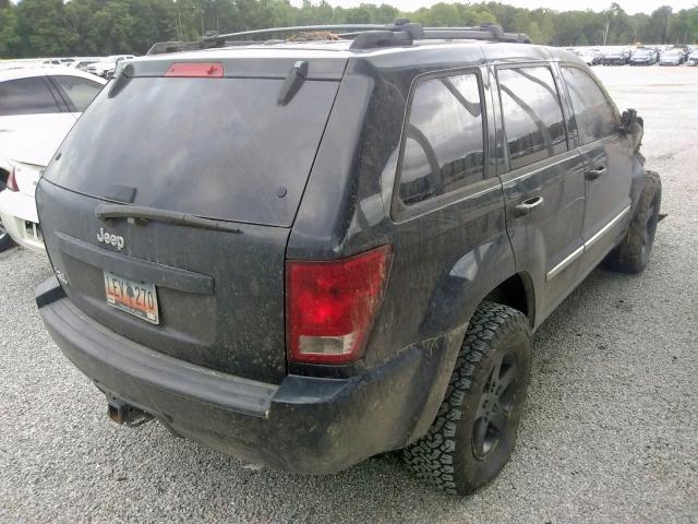 1J8GR48K09C550630 - 2009 JEEP GRAND CHER BLACK photo 4