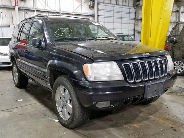 1J4GW58N61C513144 - 2001 JEEP GRAND CHER BLACK photo 1