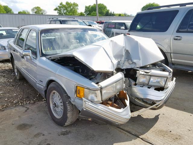 1LNLM83W1PY601943 - 1993 LINCOLN TOWN CAR C SILVER photo 1