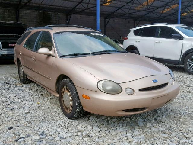 1FALP58S1VA136043 - 1997 FORD TAURUS LX GOLD photo 1